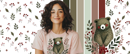 Woman wearing a floral bear graphic tee with cottagecore botanical background — The Folk Brush