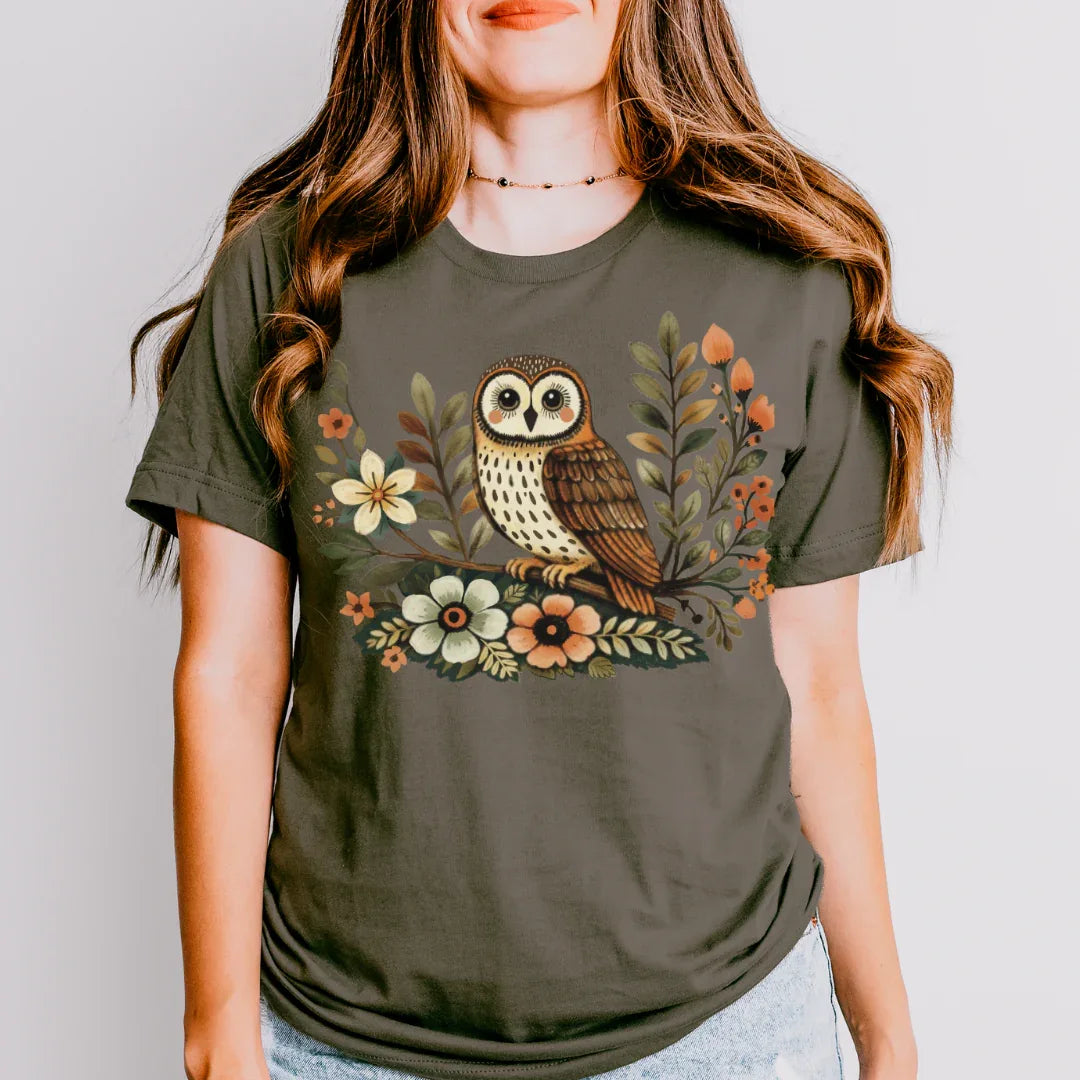 Army green Bella+Canvas 3001 tee with boho owl graphic and hand-drawn wildflowers