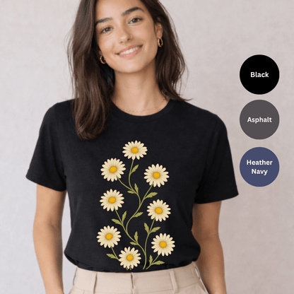 Black Bella+Canvas 3001 t-shirt with vertical daisy stem graphic in warm yellow and muted green