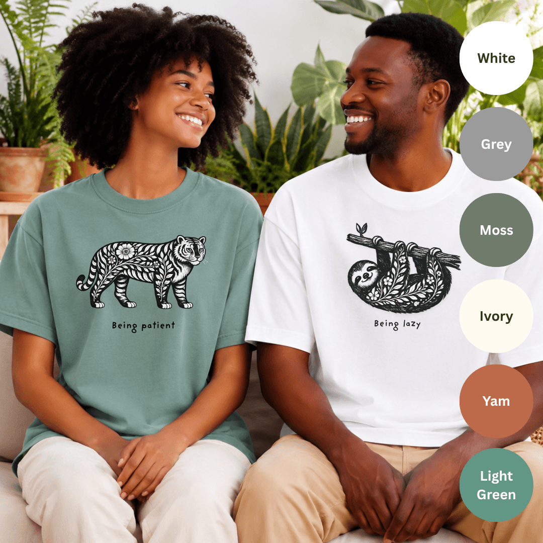 Couple wearing matching Being Lazy sloth and Being Patient tiger Comfort Colors 1717 tees in  light green and white