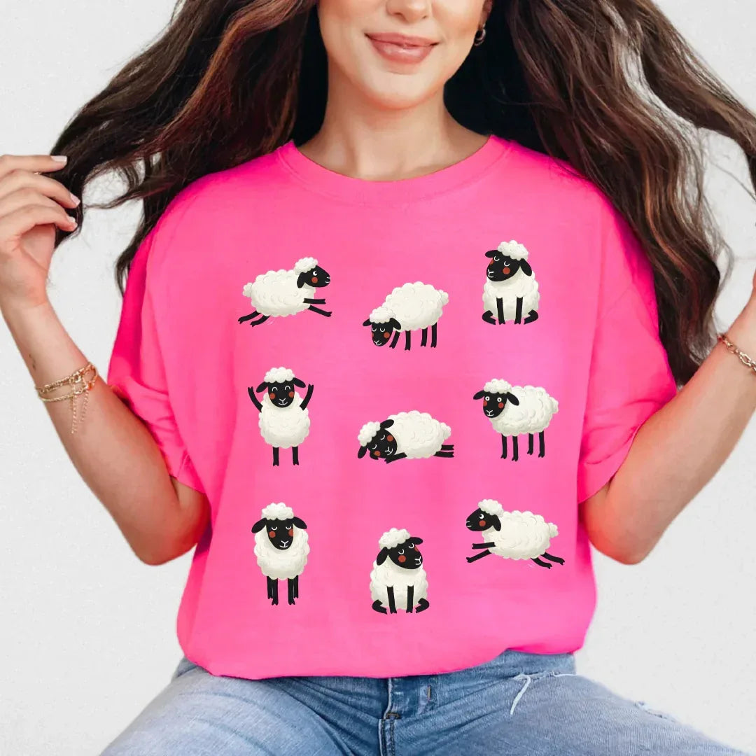 Cozy Sheep Cotton T-Shirt in Neon Pink — folk art sheep print garment-dyed tee