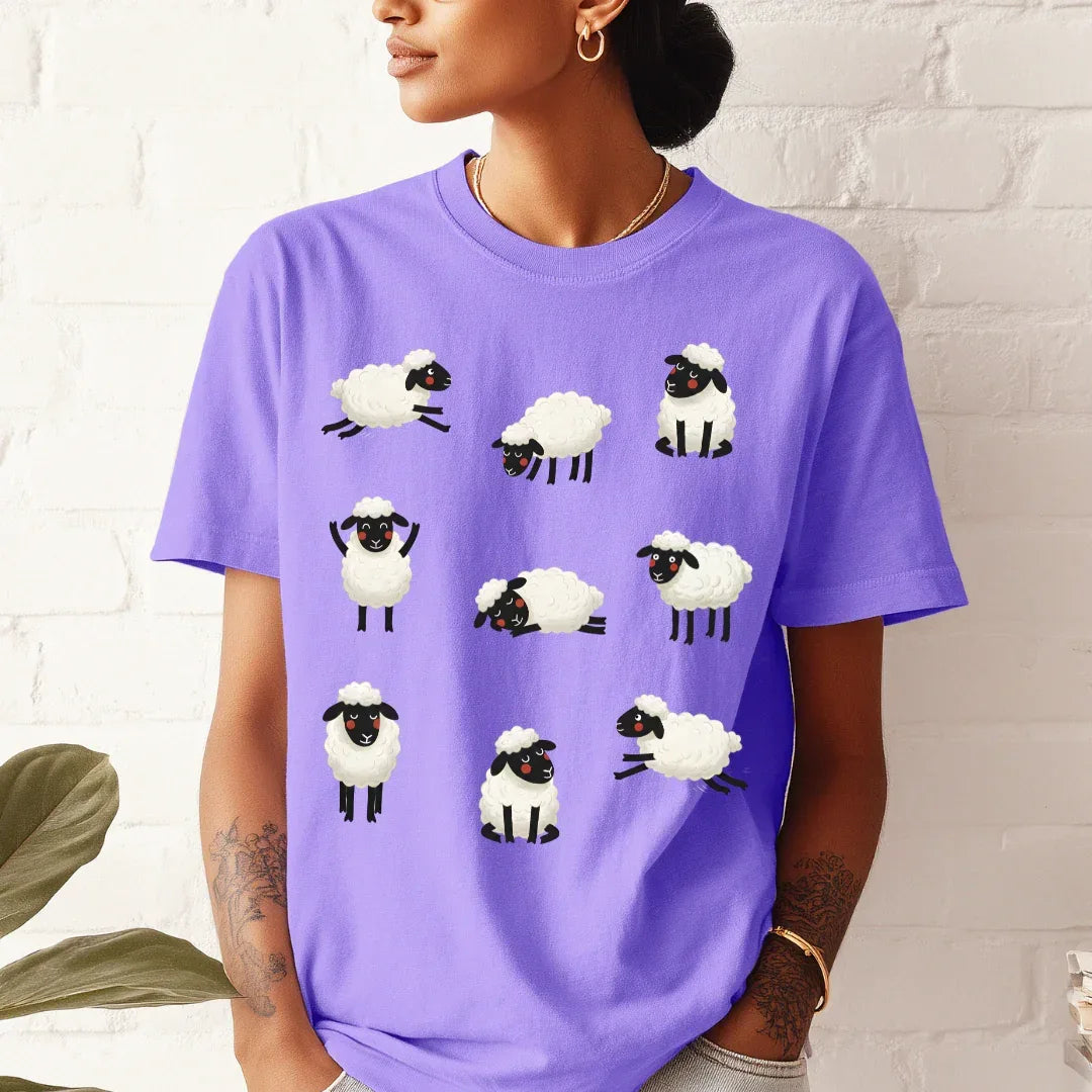 Cozy Sheep Cotton T-Shirt in Violet — illustrated sheep folk art tee by The Folk Brush