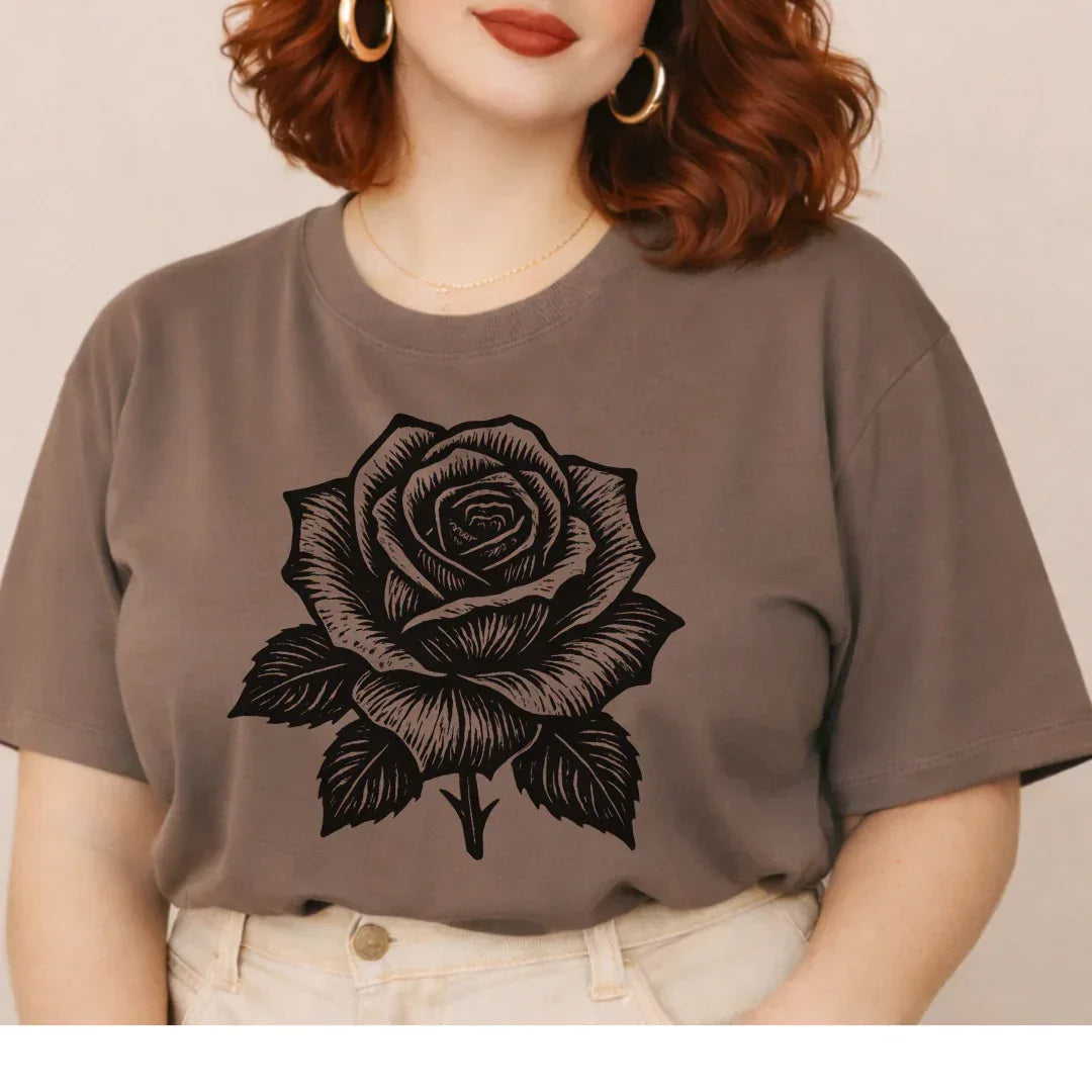 Folk art black rose graphic tee in espresso — vintage botanical shirt styled casually