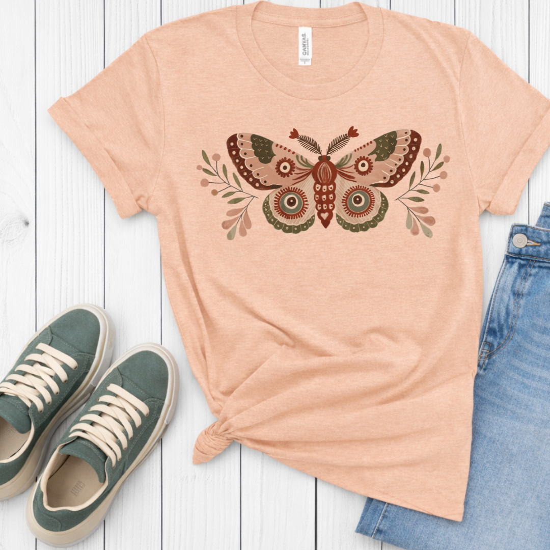 Folk moth graphic t-shirt heather peach Bella+Canvas 3001