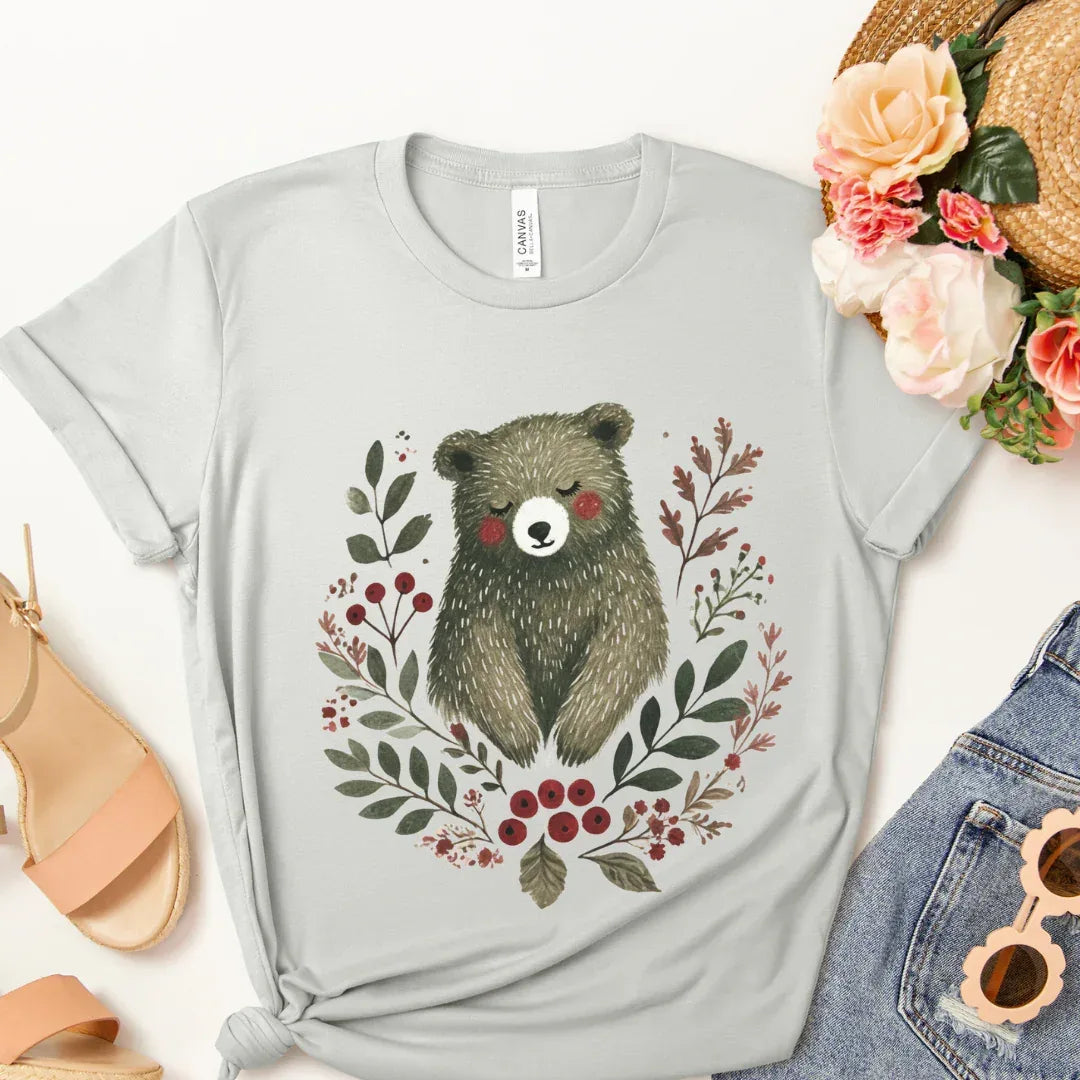 Hand-painted woodland bear with leaves and berries folk art print — grey cottagecore graphic tee