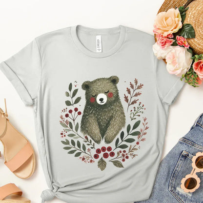 Hand-painted woodland bear with leaves and berries folk art print — grey cottagecore graphic tee