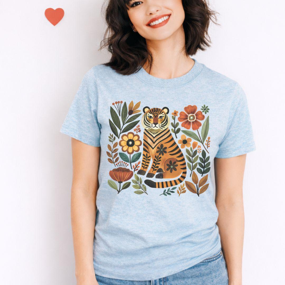 Heather ice blue Bella+Canvas 3001 t-shirt with folk art tiger and blooms in earthy tones