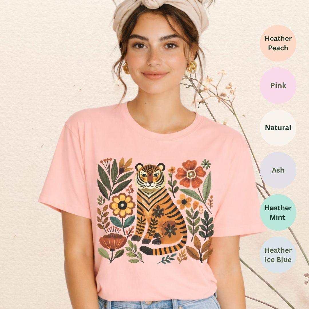 Heather peach Bella+Canvas 3001 t-shirt with vintage folk art tiger and floral graphic in earthy tones