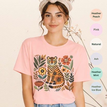 Heather peach Bella+Canvas 3001 t-shirt with vintage folk art tiger and floral graphic in earthy tones