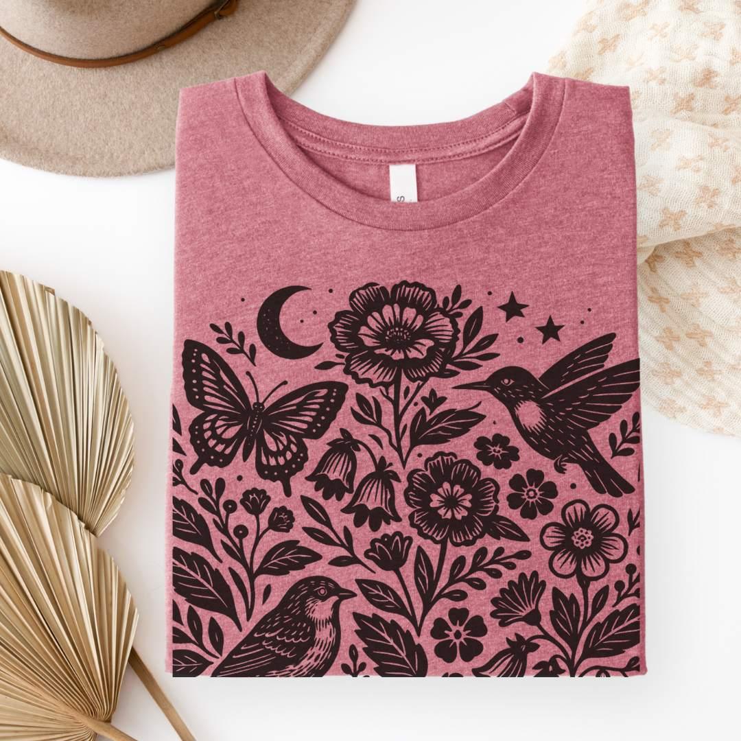 Moon Folk Garden T-Shirt in Heather Mauve — folk garden print detail birds and florals