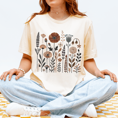 Natural Bella+Canvas 3001 t-shirt with folk wildflower meadow design in earthy colors