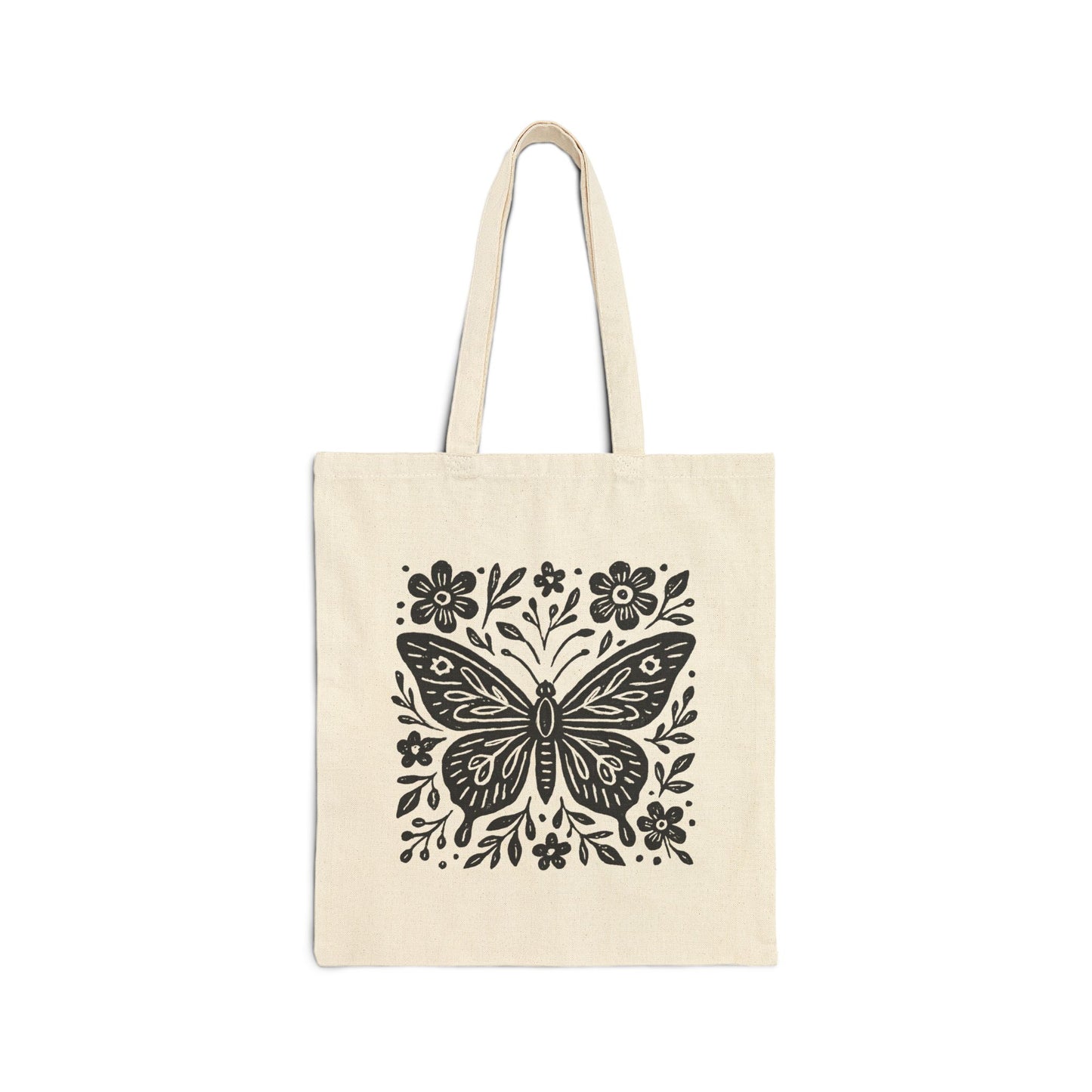 Natural canvas cotton tote bag with bold black folk art butterfly and floral graphic