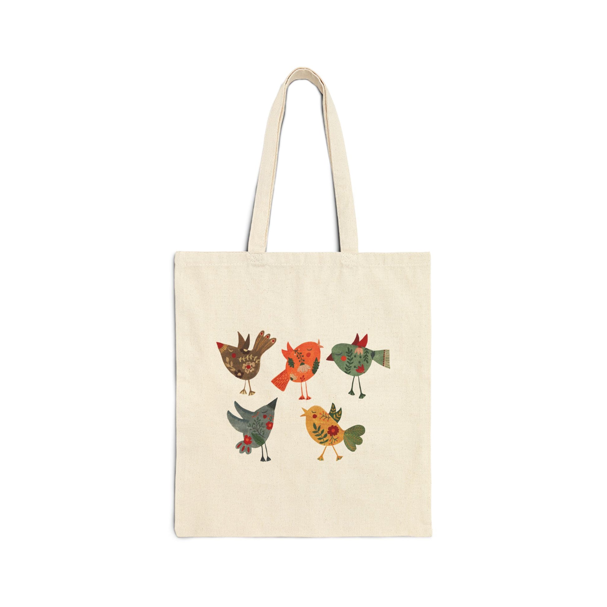 Natural canvas cotton tote bag with cheerful folk birds graphic in warm earthy tones