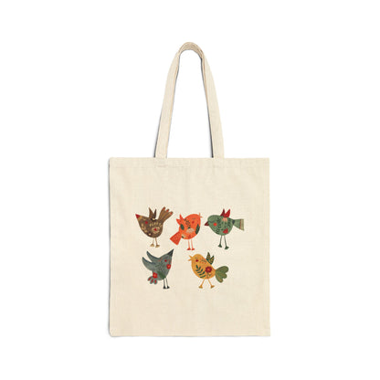 Natural canvas cotton tote bag with cheerful folk birds graphic in warm earthy tones