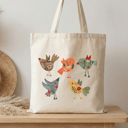 Natural canvas cotton tote bag with colourful folk bird design featuring floral details