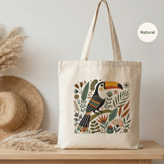 Natural cotton canvas tote bag with tropical toucan folk art print — hand-painted folk creatures bag by The Folk Brush