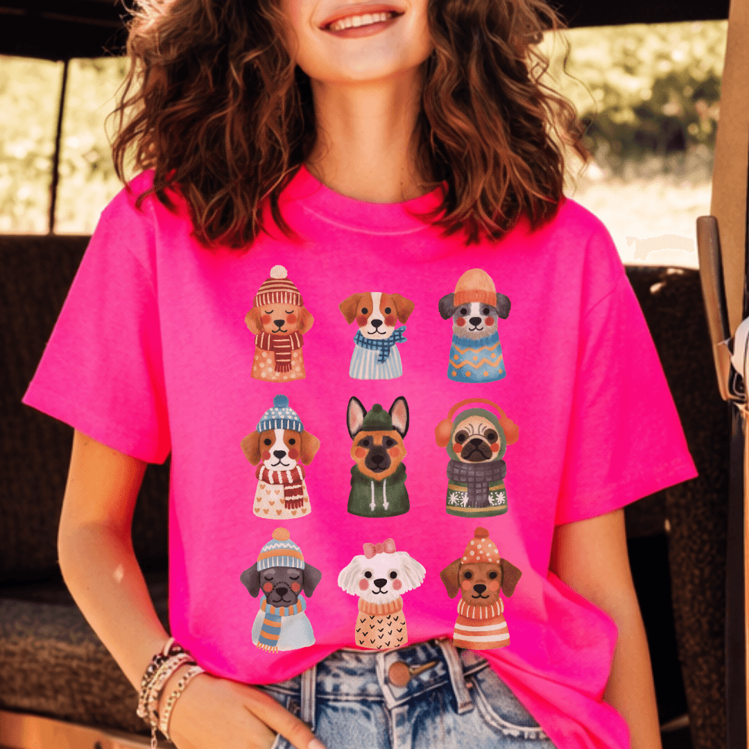 Neon pink Comfort Colors 1717 tee with cute dogs wearing scarves and sweaters graphic