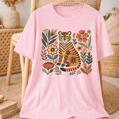 Pink Bella+Canvas 3001 tee with folk tiger and wildflower illustration, flat lay
