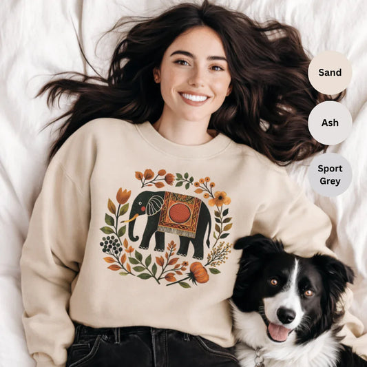 Sand Gildan 18000 crewneck sweatshirt with boho elephant and wildflower wreath graphic in warm earth tones