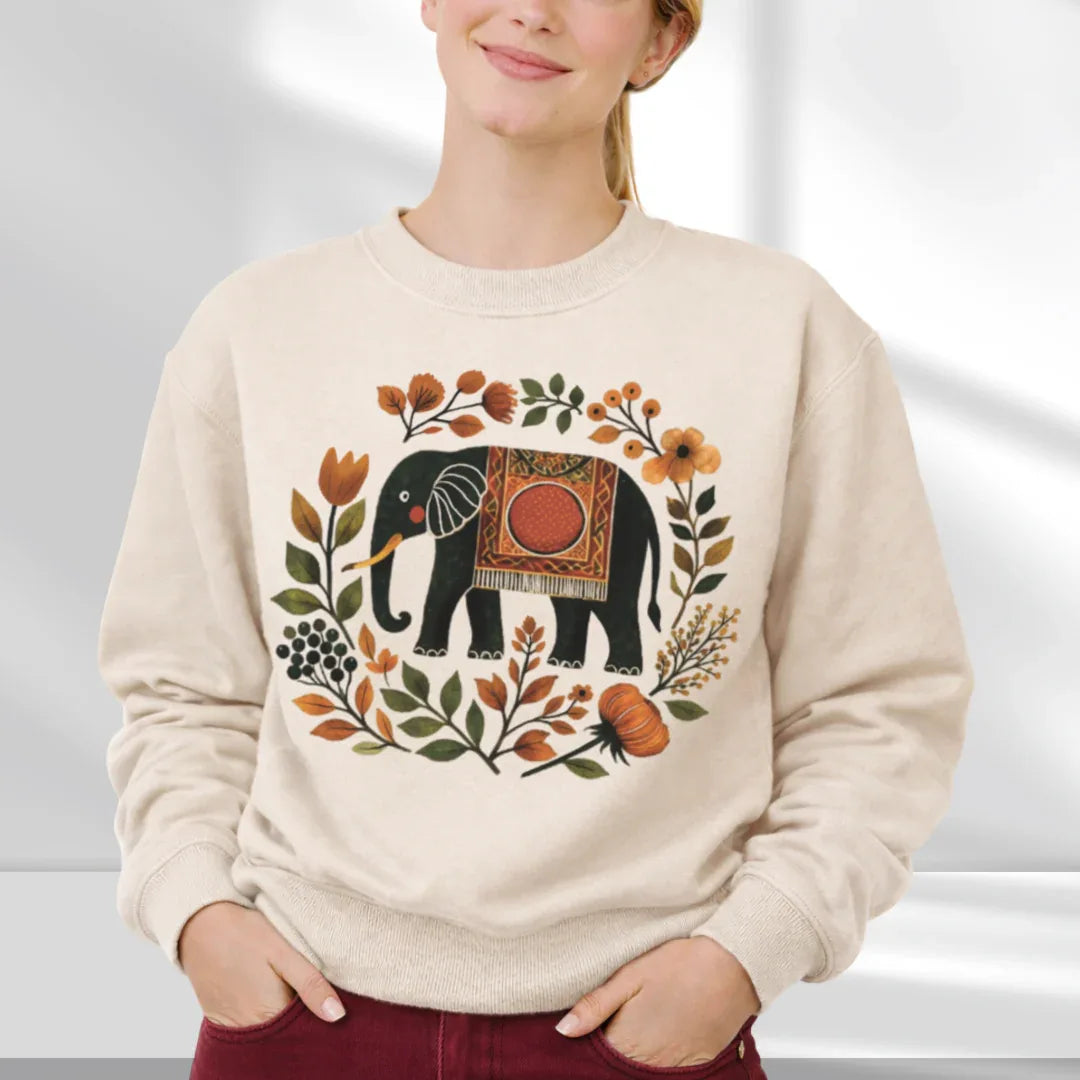 Sand Gildan 18000 crewneck sweatshirt with folk-art elephant and floral wreath design