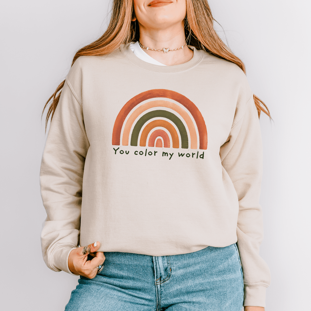 Sand Gildan 18000 crewneck sweatshirt with muted rainbow and inspirational lettering