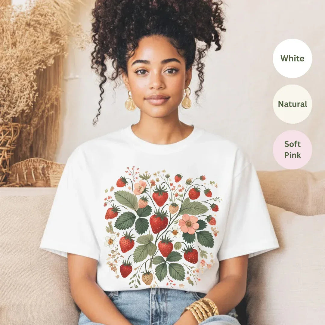 Strawberry floral folk art graphic tee on white t-shirt — botanical design by The Folk Brush