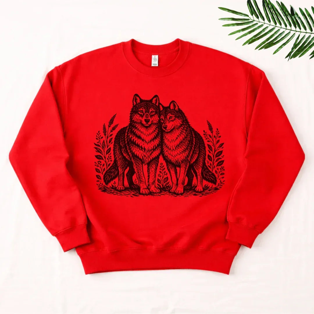 Two Wolves Crewneck Sweatshirt in Red — wolf and foliage folk art crewneck by The Folk Brush