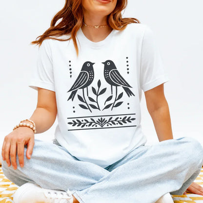 Two folk birds hand-painted Scandinavian print on white cotton t-shirt — folk art tee