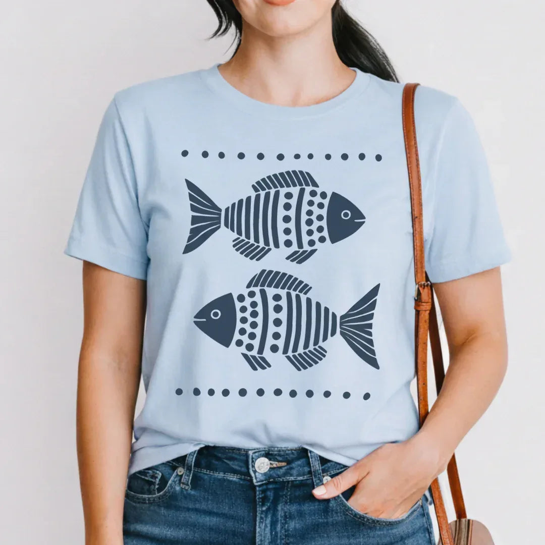 Two folk fish t-shirt in light blue — folk art nautical graphic tee for women
