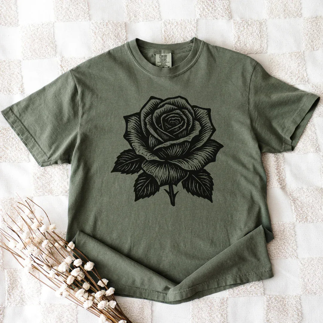 Vintage black rose t-shirt in green — bold mono folk floral tee for women