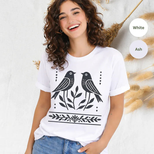 bird folk Scandinavian graphic tee in white — hand-painted folk art bird t-shirt by The Folk Brush